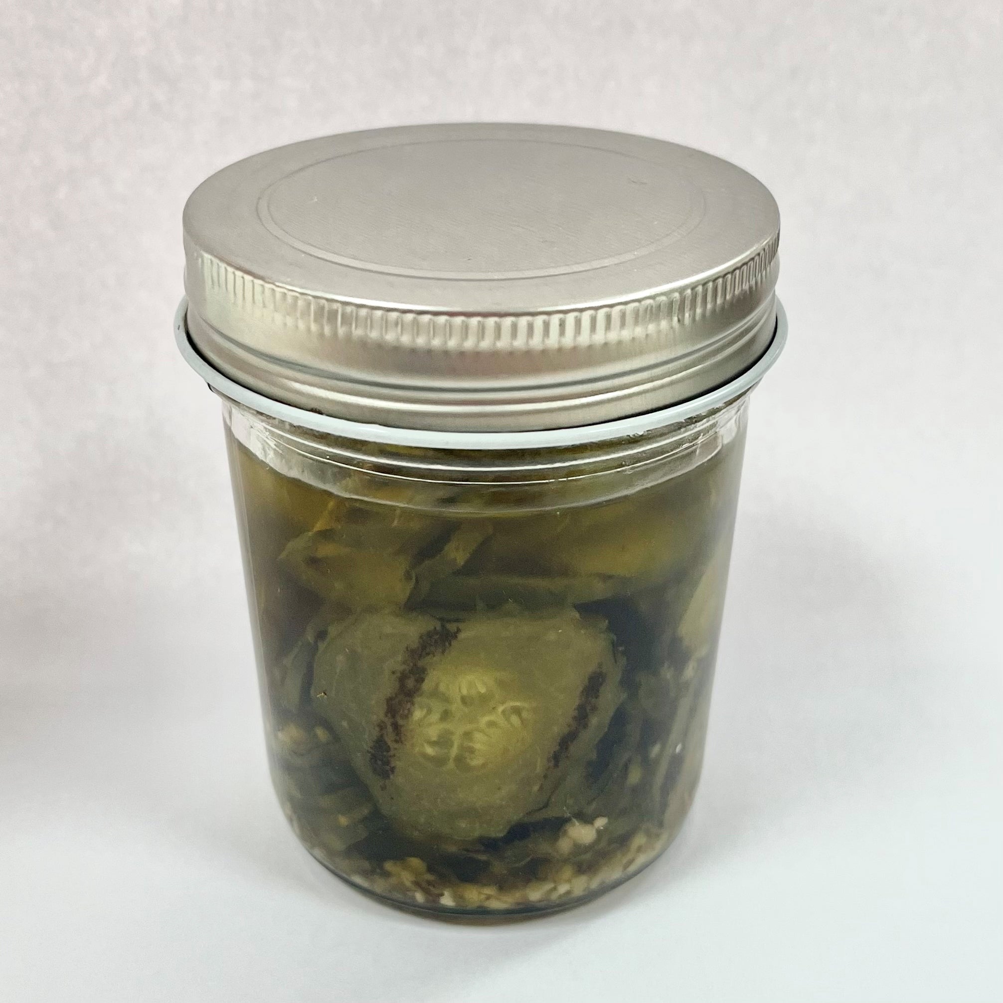 Grilled green melon slices in oil